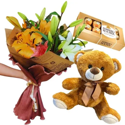 Ramo de flores liliums chocolates y peluche